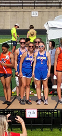 4x400 Relay of Alexa Glancy, Veronica Fitzgerald, Alyssa Masserant, and Jenna Pilachowski at the awards stand after finishing 7th at the D2 State Finals.